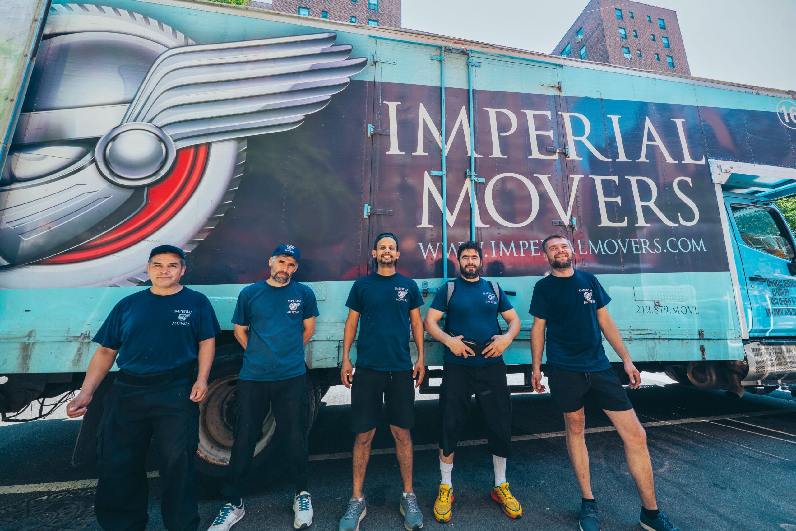 Imperial Movers standing in front of truck